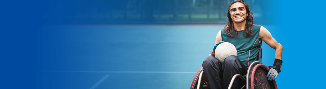 Man in wheelchair at a sports court