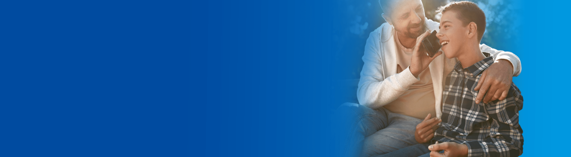 Father and son on a phone