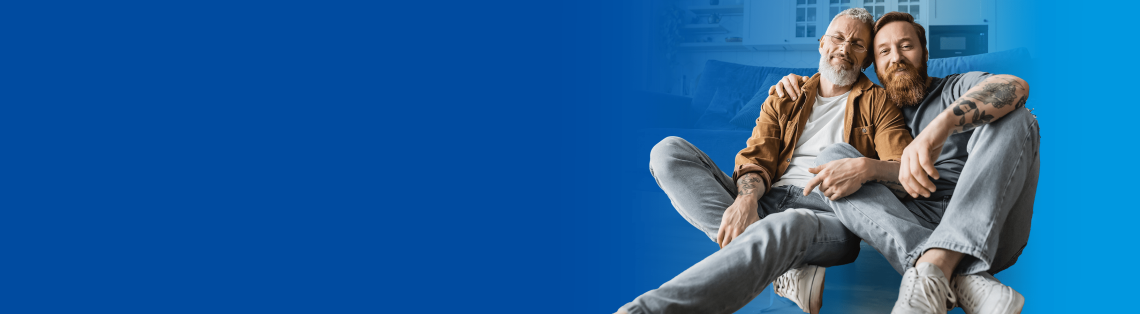 Two men smiling together